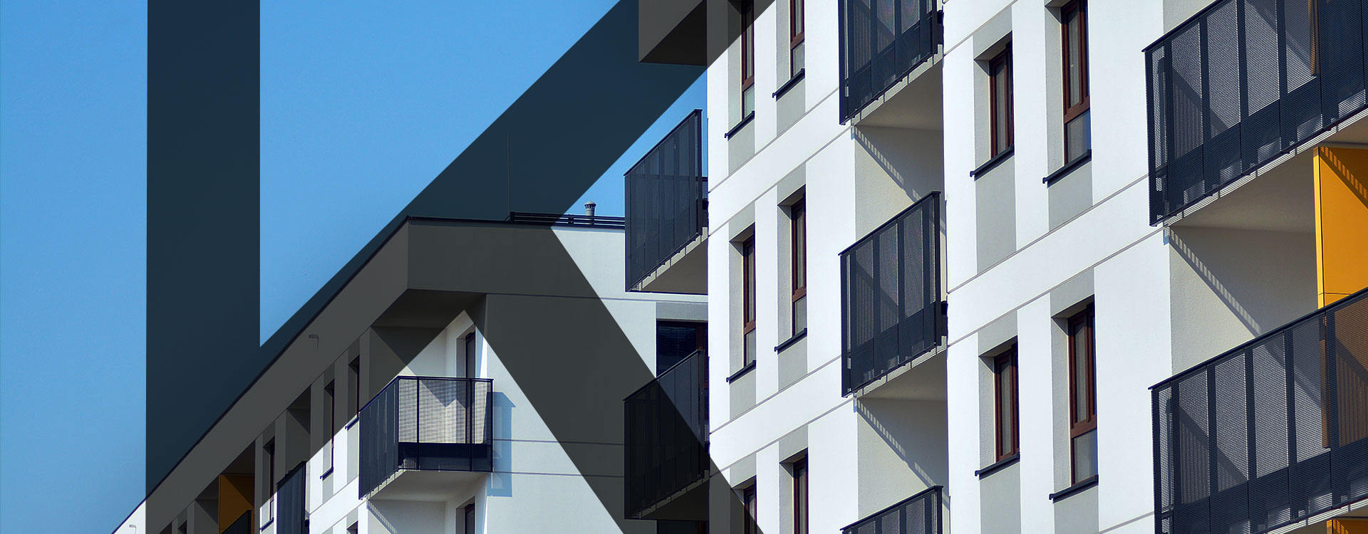 Apartment-buildings-with-blue-sky-with-Khusela-letter-K-overlay