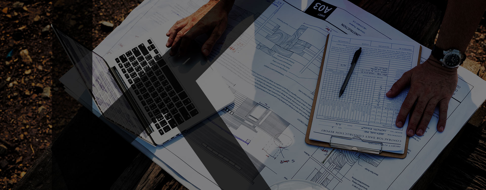 Darker-Planning-papers-with-a-apple-laptop-with-letter-k-as-overlay